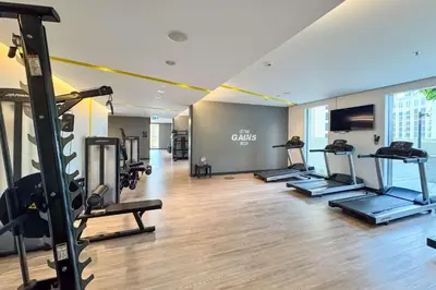 a gym with treadmills and cardio equipment in a building at PVH - Serene Central 2BR - Creek Horizon in Dubai