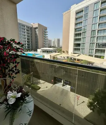 a balcony with a view of a building at Brand New Luxury Home in a prime location in Dubai