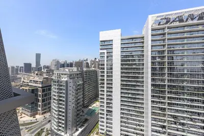 a view of a large building in a city at Vayk - Spacious and Vibrant 2BR Apartment in Business Bay in Dubai