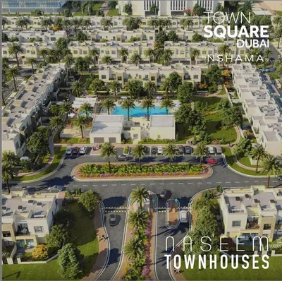 an aerial view of a parking lot with condos at Luxury 5 bed Villa close to Pool, Gym and Play Areas in Dubai