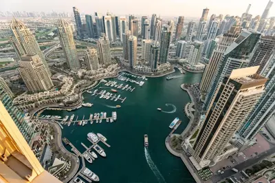 an aerial view of a city with a harbor at GuestReady - 2BR l Marina View + Infinity Pool in Dubai