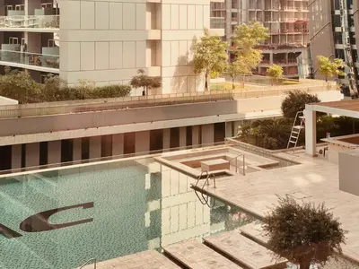 a swimming pool on top of a building at Premium Guest - Majestine Downtown Luxe in Dubai