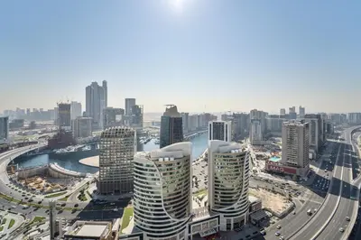 an aerial view of a city with tall buildings at Refined 1 bedroom - Upper Crest - Near Dubai Mall in Dubai