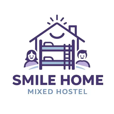 a logo for a haunted house with two men holding a gate at Smile Home Marina JBR Bed space in Dubai