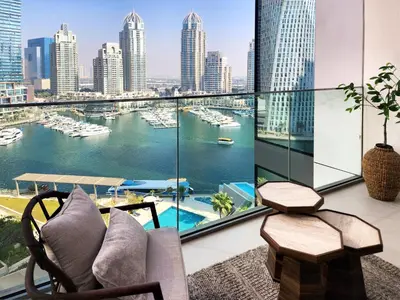 a living room with a view of a harbor at SOLARTE Luxe - LIV Marina - Premium 2BR Residence in Dubai