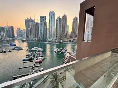 a view of a city with boats in the water at Free Infiniti Pool and Jacuzzi - Marina Gate Luxury Stay - Enjoy Dubai Marina Views in Dubai