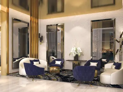 a lobby with white chairs and mirrors at High Floor Balcony Suite 8 mins to Burj Khalifa in Dubai