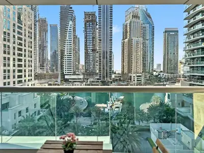 a view of the city from the balcony of a building at Breathtaking 2BR in Marina - Steps to Metro in Dubai