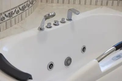 a white sink with a faucet in a bathroom at Modern 4Bedroom Villa in Al Furjan in Dubai