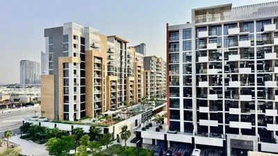 an aerial view of a city with tall buildings at Luxury Stay in Meydan - 10min to Downtown in Dubai
