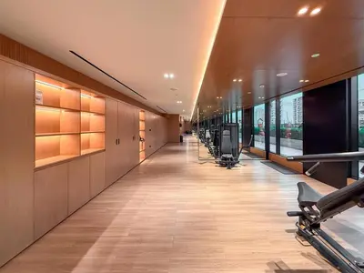 a hallway in a building with a gym at GuestReady | 2 BR | Luxury Apt with Private Pool in Dubai
