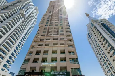 two tall buildings next to each other at Marina View Apartment Near JBR Beach & Marina Mall in Dubai