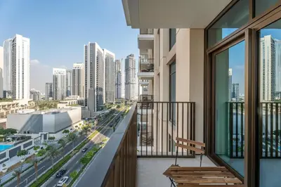 a balcony with a view of a city at GuestReady - 1BR | Serene Home in Creek Harbour in Dubai