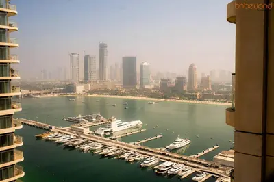 a view of a harbor with boats in the water at Beach vibes with Serene views in Dubai