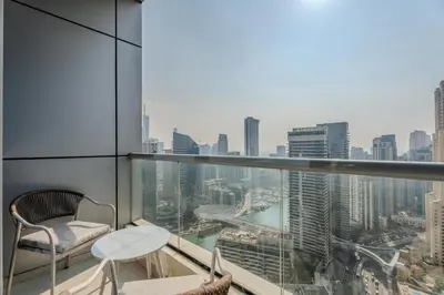 a balcony with a view of a city at Gala Guests - Luxury Dubai Marina View Apartments - 1 min Walk to Tram in Dubai