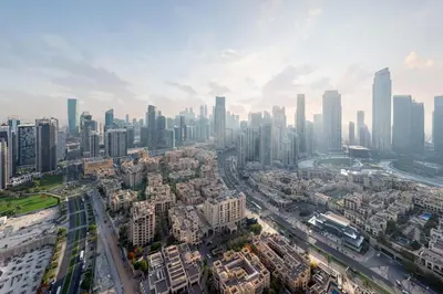 an aerial view of a city with tall buildings at Burj Royale Luxury 3BR Apartment in Dubai
