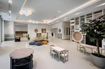 a living room with a couch and a table at 1BR with Full burj khalifa and fountain view in Dubai