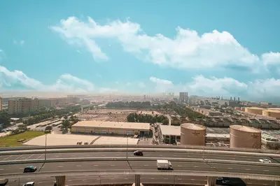 a view of a highway with a city in the background at Luxury 3 BHK in Dubai Marina DEC 1402 T2 in Dubai