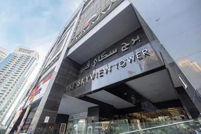 a building with a sign for a shopping center at 2BR Near to Beach JBR Dubai Eye & Sea View SV 2805 in Dubai
