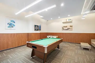 a billiard room with a pool table at Urban Chic 1Bedroom in DEC Tower Marina in Dubai