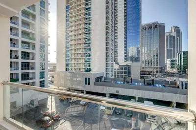a view of a city from the balcony of a building at Urban Chic 1Bedroom in DEC Tower Marina in Dubai