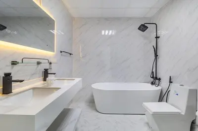 a white bathroom with two sinks and a tub at Luxury 3 BR in Dubai Marina By dPie DEC 2003 in Dubai