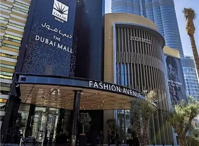 a building with a sign that reads the dubai mall at Burj Khalifa Area- 2 Chic BR, Act Tower Dubai Mall in Dubai
