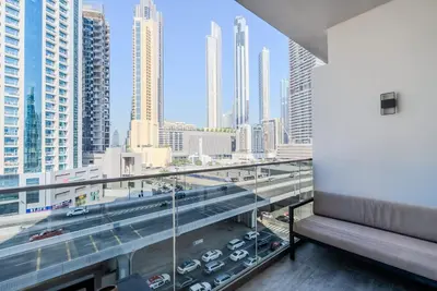 a balcony with a view of a city at TRPS - MAG 318, Business Bay - Walk to Dubai Mall, Furnished Apt, Premium Amenities in Dubai