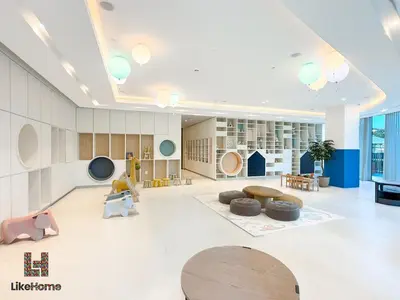 a large room with a lobby with tables and chairs at Wake Up to Burj Khalifa Views Next to Dubai Mall Luxury 2BR Downtown Like Home in Dubai