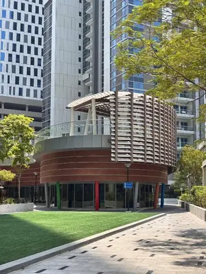 a building in a city with tall buildings at DT Penthouse • 250sqm • Billiards • Terrace & Pool in Dubai