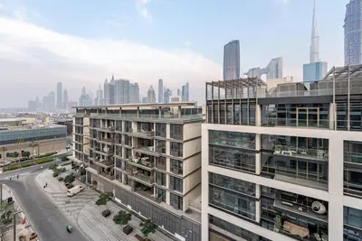 an aerial view of a city with tall buildings at Stylish 1BR in CityWalk, Stunning Burj Khalifa view in Dubai