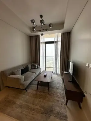 a living room with a couch and a tv at Skyline 2BR - AYKON CITY Tower C-Business Bay 5101 in Dubai
