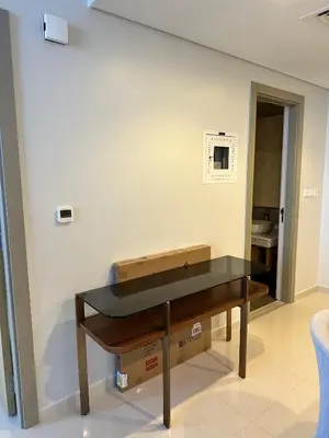 a desk in a room with a wall at Skyline 2BR - AYKON CITY Tower C-Business Bay 5101 in Dubai