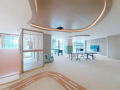 a dining room with a table and chairs in it at Vacationer l Modern 1 Bed l Private Pool l Community Views in Dubai