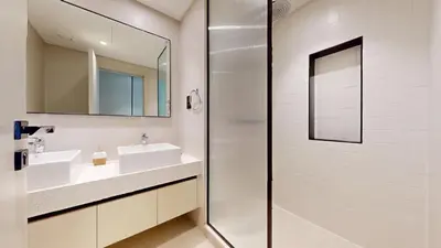 a bathroom with a sink and a mirror at Vacationer l Classic 2 Bedroom l Marina Views l Private Beach in Dubai
