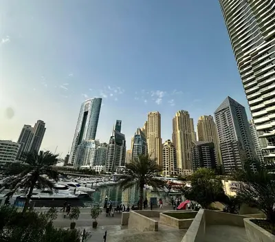 a view of a city with a river and buildings at Spacious 1 Bedroom Apartment-Opal Tower Dubai Marina in Dubai