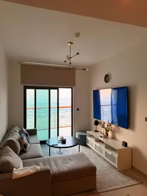 a living room with a couch and a table at Magra CHILL SPOT HOSTEL in Sabkhah