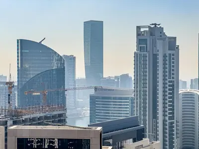 a view of a city with tall buildings at Luxury 1BR Downtown, Pool, Gym, Opera District in Dubai