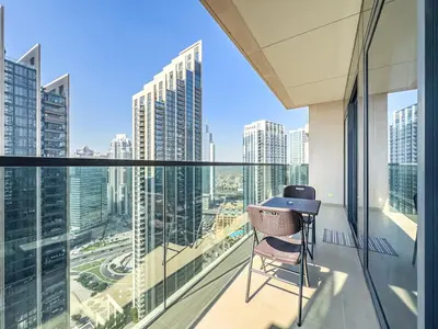 a balcony with a view of a city skyline at Luxury 1BR Downtown, Pool, Gym, Opera District in Dubai