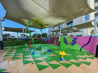 a childrens play area with a play implement in a building at Bookable 1 Bed Aykon City with Amazing Bird eye view in Dubai