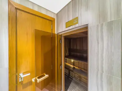 an open door to a walk in closet at Bookable 1 Bed Aykon City with Amazing Bird eye view in Dubai