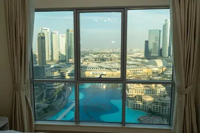 a view of a city from a hotel room window at 3BR Luxury Burj Residence Full Burj Khalifa in Dubai