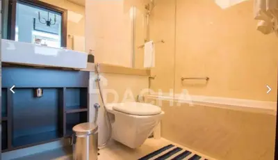 a bathroom with a toilet and a sink at Prime Location - Dubai Marina 1br - King Size Bed in Dubai