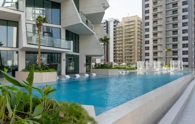 a swimming pool in the middle of a building at Binghatti Phantom 1BR Luxe Suite with Private Pool in Dubai