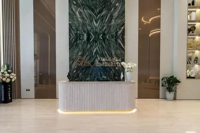 a lobby with a large display in a building at Binghatti Phantom 1BR Luxe Suite with Private Pool in Dubai