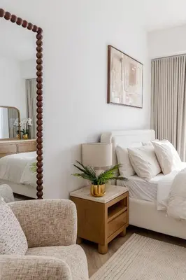 a living room with a couch and a chair at Stylish Studio with Marina View JBR in Dubai