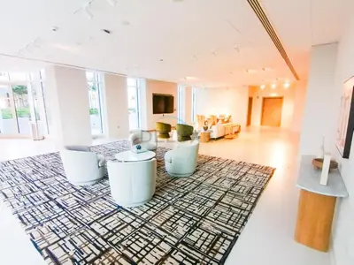 a living room with white furniture and a rug at Harbour-View 3BR with Assistant Room, Just a Stones Throw from Marine Transportation, Harbour Gate Tower 1, Creek Harbour by Deluxe Holiday Homes in Dubai