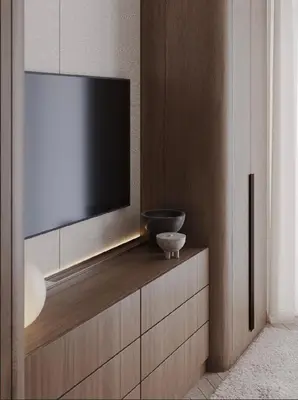 a flat screen tv sitting on top of a cabinet at Luxurious 3br apartment Dubai mall in Dubai
