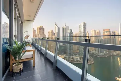 a balcony with a view of a city skyline at Frank Porter - Silverene Towers in Dubai