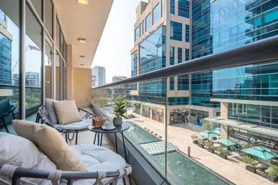 an apartment balcony with a view of a city at Frank Porter - Bay Square in Dubai